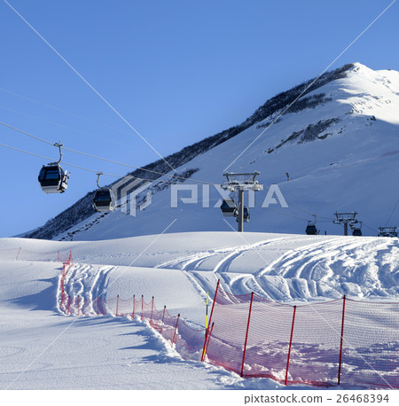 Gondola lift on ski resort at sun winter day 26468394