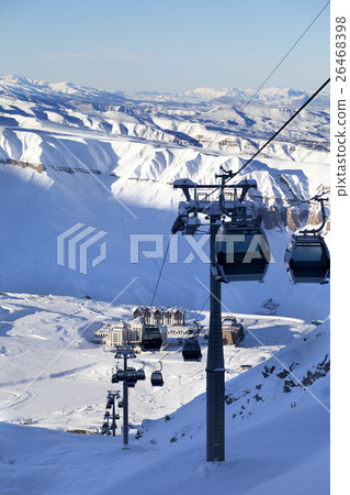 Gondola lift on ski resort at sun evening 26468398