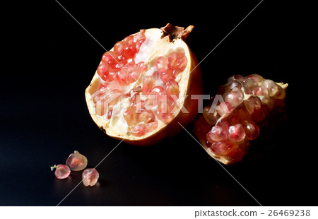 Pomegranate on black background 26469238