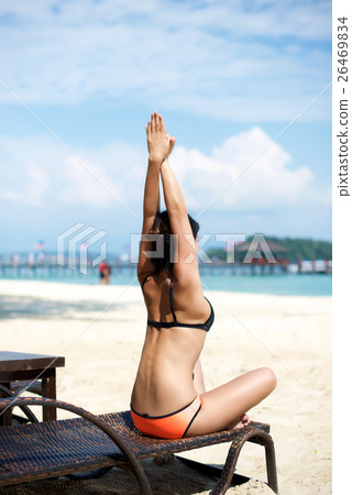 Asian girl doing Yoga on a recliner chair 26469834