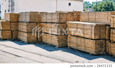 stacked piles of timber product 26472155
