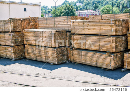 stacked piles of timber product 26472156