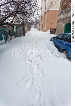 Snow storm hits city. street after blizzard 26472179