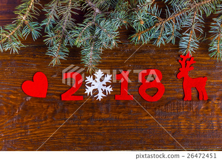 the numbers of the new year with Christmas symbols 26472451