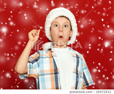 boy child portrait on red, winter holiday concept boy child portrait on red, winter holiday concept 26472632