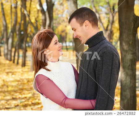 romantic people, happy adult couple in autumn park romantic people, happy adult couple in autumn park 26472882