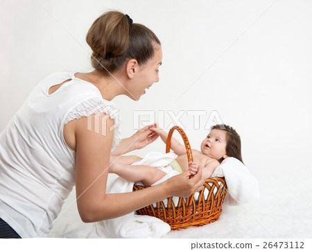 mother talk with baby in basket, family concept mother talk with baby in basket, family concept 26473112