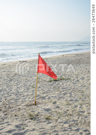 Red warning flag on the beach, no swimming 26473649