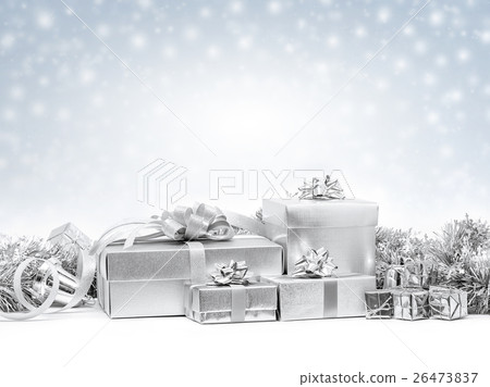 Celebration silver gift boxes on snow background 26473837