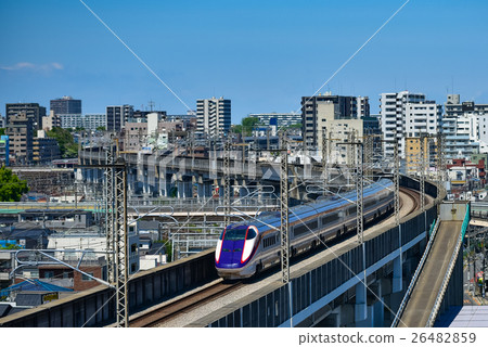 Shinkansen passing through the elevated Shinkansen passing through the elevated 26482859