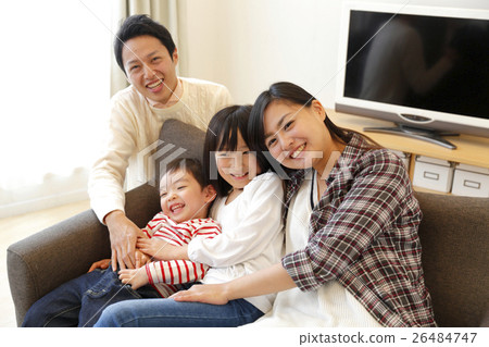 Family family relaxing in the living room Family family relaxing in the living room 26484747