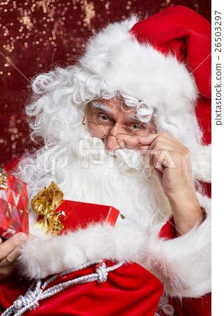 Portrait of Cheerful Santa Claus in Christmas concept against r Portrait of Cheerful Santa Claus in Christmas concept against r 26503297
