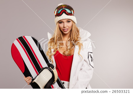 attractive sexy woman standing holding snowboard 26503321