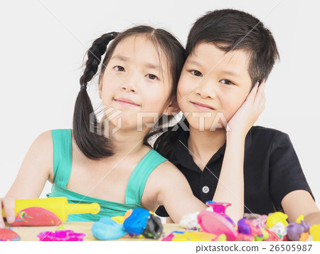 Asian kids are playing colorful clay toy Asian kids are playing colorful clay toy 26505987