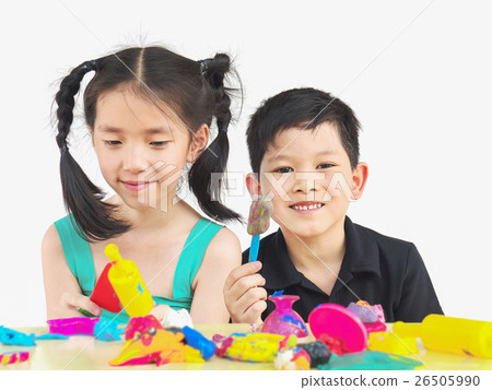 Selective focused of happy Asian kids playing clay 26505990