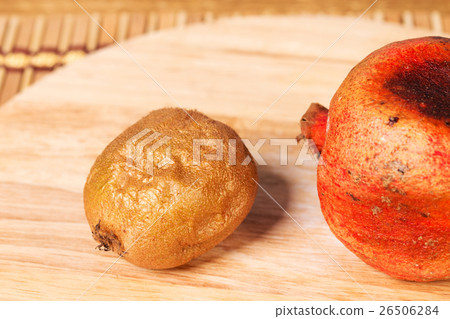 Bad kiwifruit and pomegranate Bad kiwifruit and pomegranate 26506284