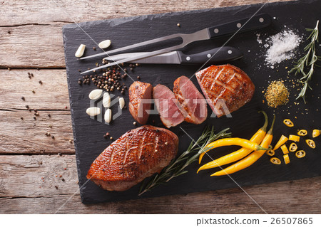 Delicious sliced roast duck breast closeup 26507865