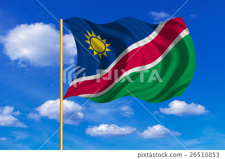 Flag of Namibia waving on blue sky background 26510853