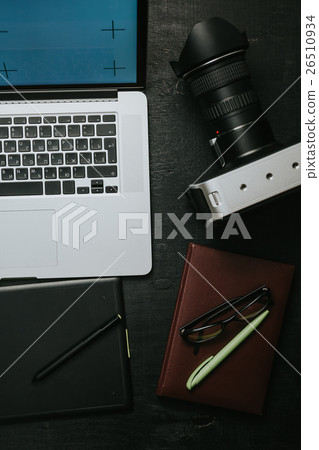 From above view of workplace with laptop From above view of workplace with laptop 26510934
