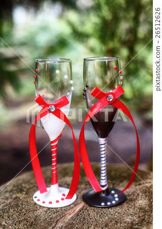 Decorated wedding glasses for bride and groom 26512626