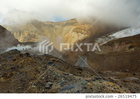 Climbing to active volcano Mutnovsky on Kamchatka. Climbing to active volcano Mutnovsky on Kamchatka. 26519475