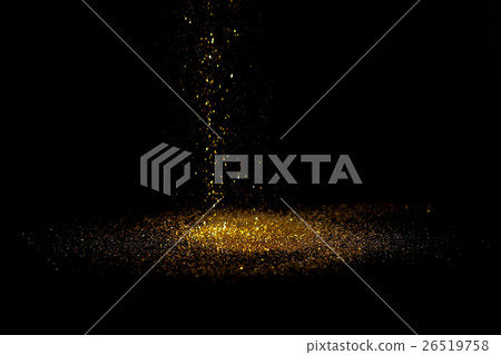 Sprinkle gold dust on a black background Sprinkle gold dust on a black background 26519758