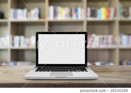 Open empty white screen laptop on wooden table Open empty white screen laptop on wooden table 26520298