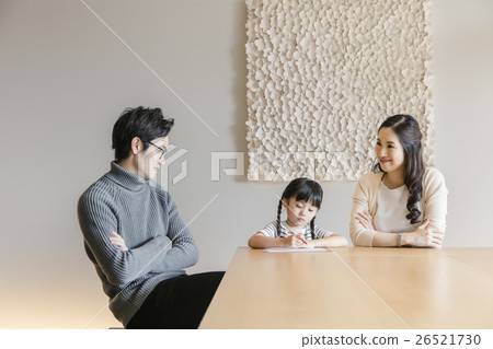 Parents relaxing indoors 26521730