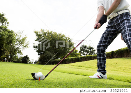 Male golfer's driver shot 26521921