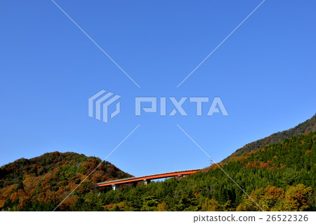 Autumn leaves red bridge blue sky 26522326
