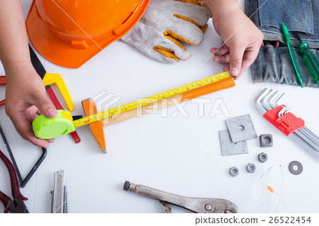 Technician use Measuring Tape Technician use Measuring Tape 26522454