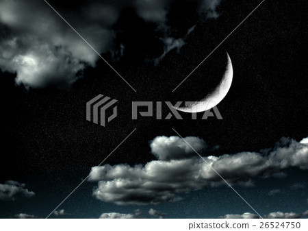 The moon in the night sky in clouds 26524750