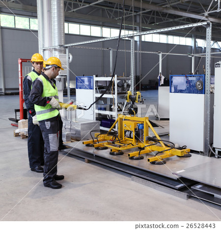 Workers at CNC factory 26528443