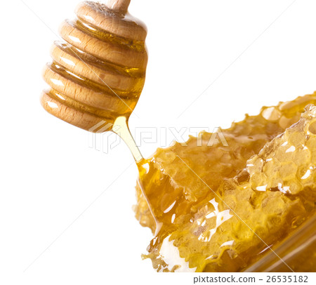flowing honey with a spoon 26535182