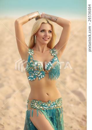 Beautidul smiling lady dancing Belly dance in the Beautidul smiling lady dancing Belly dance in the 26536864
