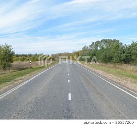 Asphalt highway with white intermittent markings 26537260