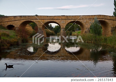 Old bridge over a river Old bridge over a river 26537843