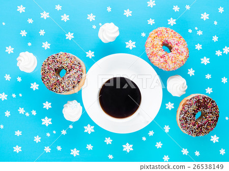 Cup of coffee with donuts and meringues in motion Cup of coffee with donuts and meringues in motion 26538149