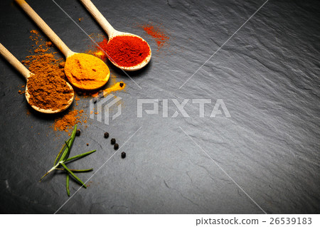 Stock Photo: spices and herbs over black