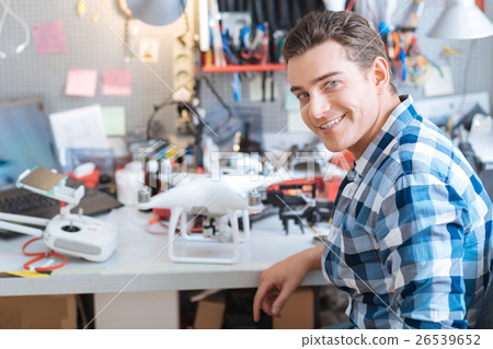 Portrain of handsome man working with drone Portrain of handsome man working with drone 26539652
