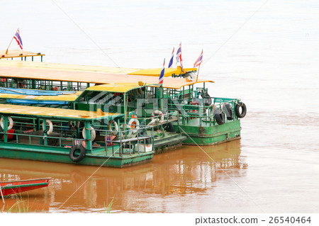 Boat across the Mekong River, Thailand - Laos. Boat across the Mekong River, Thailand - Laos. 26540464