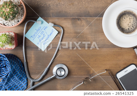paper note patient appointment on wood blackboard  26541325