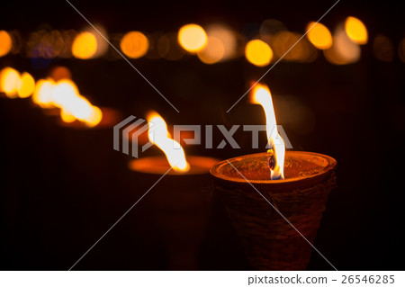Traditional wooden torch flame at night Traditional wooden torch flame at night 26546285