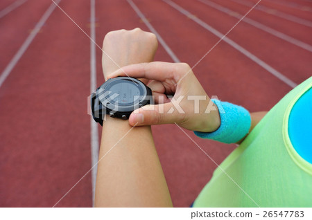 ready to run set and looking at sports smart watch 26547783