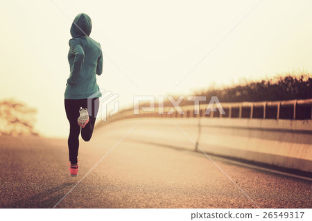 young fitness woman runner athlete running at road 26549317
