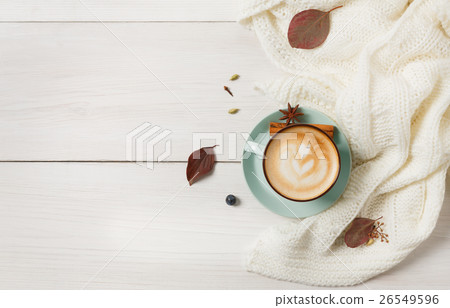 Autumn cappuccino coffee cup on white wood 26549596