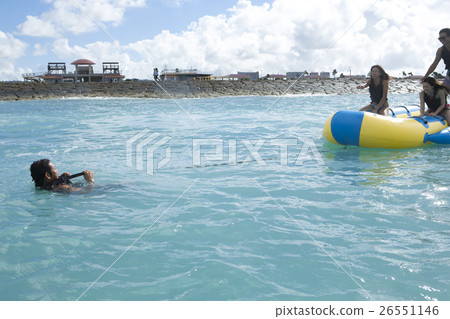 A fellow who enjoys a vacation banana boat A fellow who enjoys a vacation banana boat 26551146