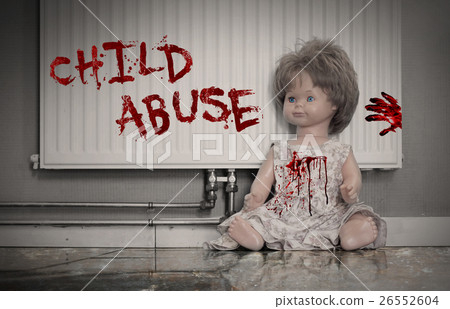 Concept of child abuse - Bloody doll 26552604