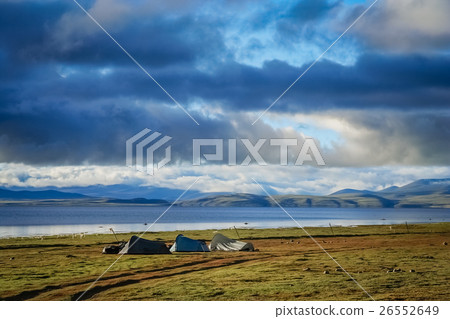 Tents pitched on the shore of Lake Manasarovar 26552649