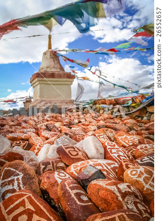 Mani stones and Buddhist stupa 26552657